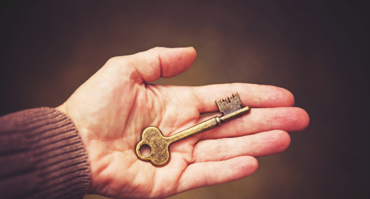 Person holding a key