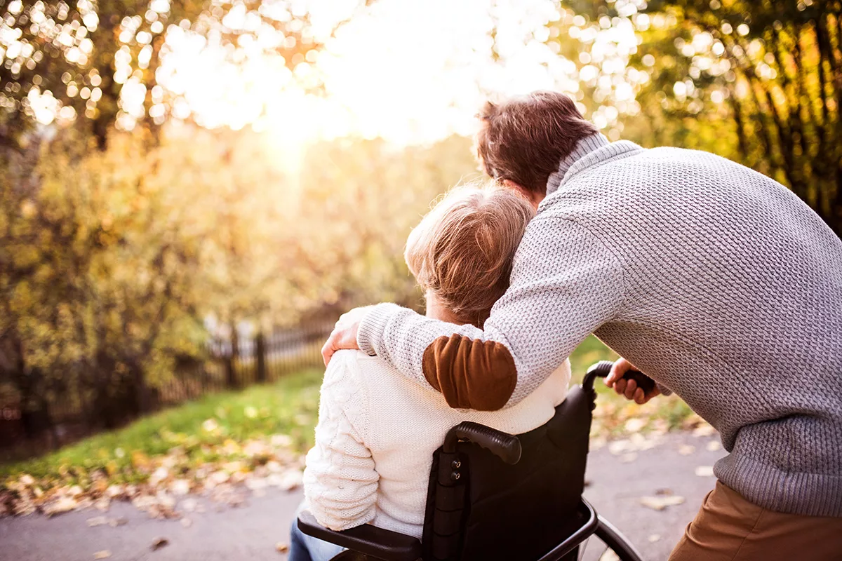 An older couple enjoys nature and one-another's company, illustrating Mainstream Capital's understanding that money decisions involve emotions and values
